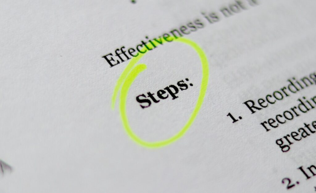 A paper with the word "step" circled.